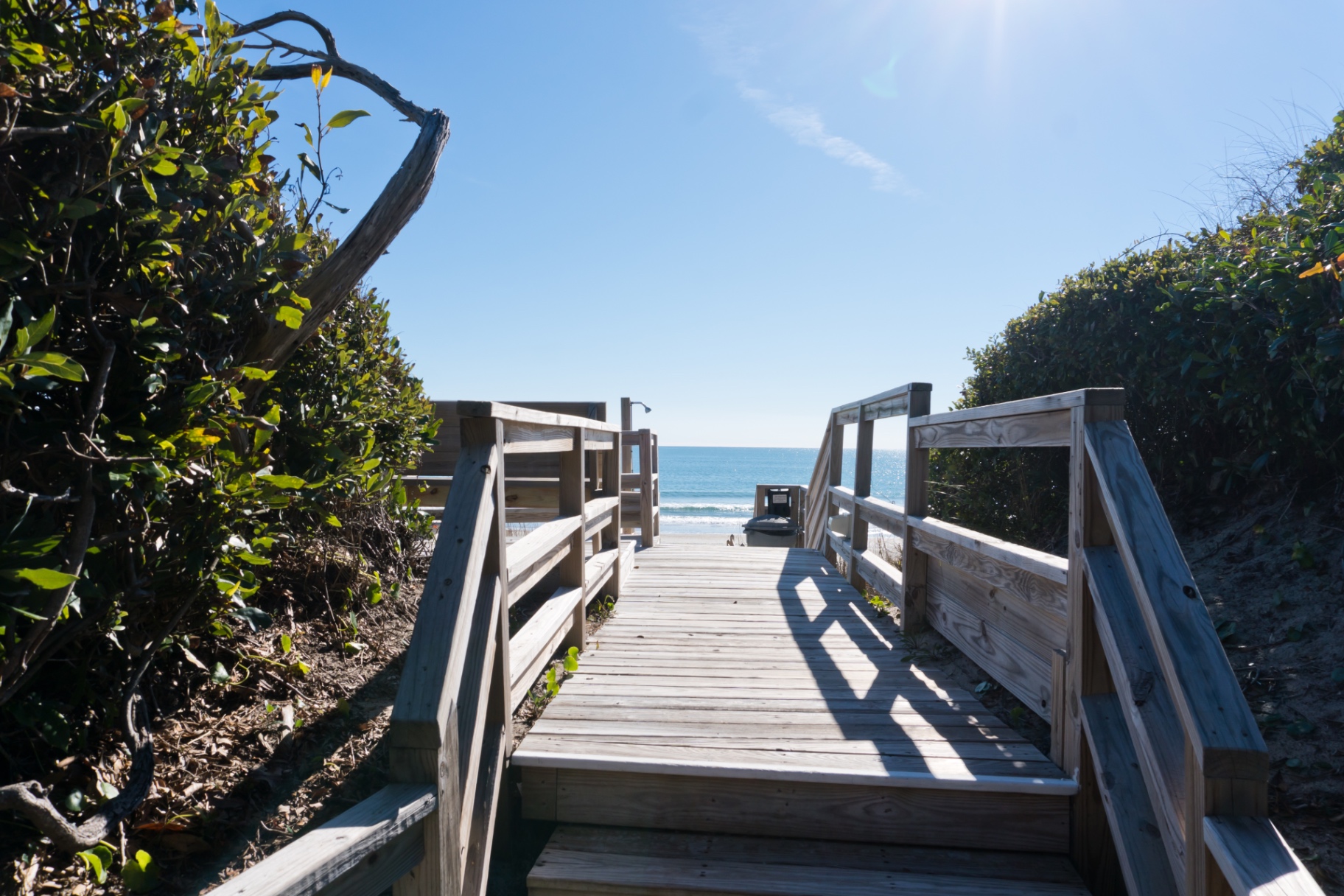 Boardwalk stairs leading down to the beach at Coral Shores 12
