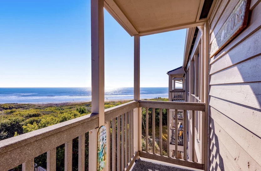 Private covered oceanfront balcony at Island Beach & Racquet Club B302
